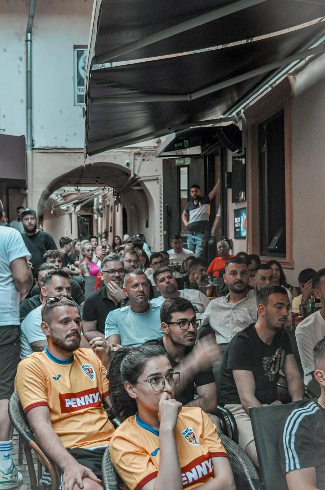 Match on screen, summer night