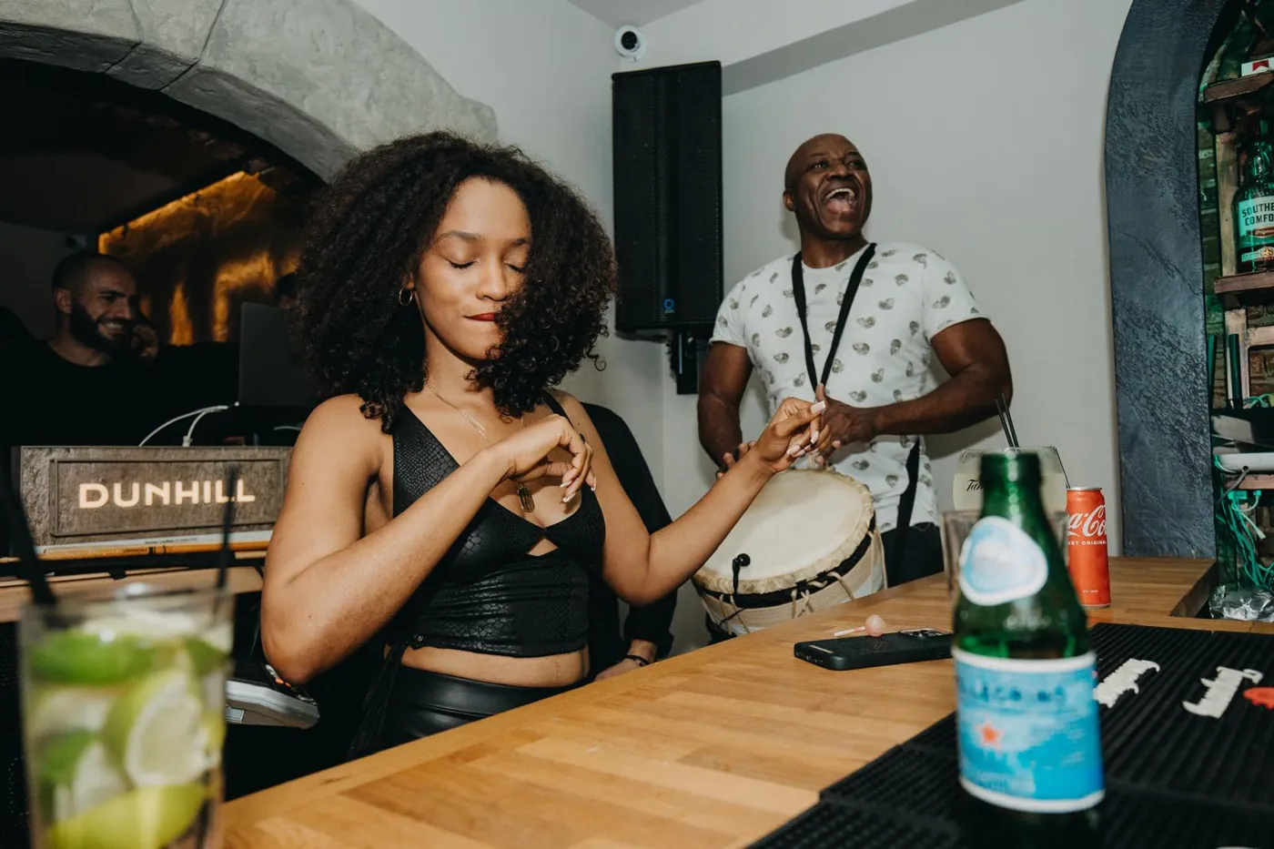 The bartender mixing a cocktail