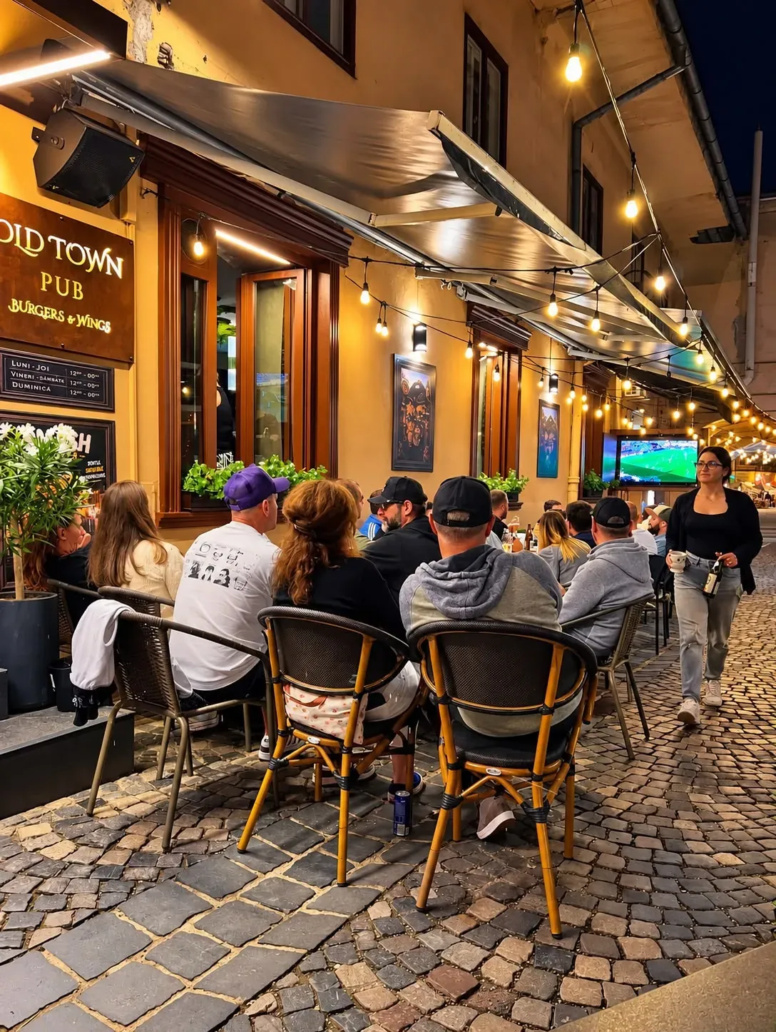 Tables on the cobbles outside the pub